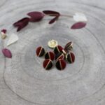 Black and Amarante Wink Button